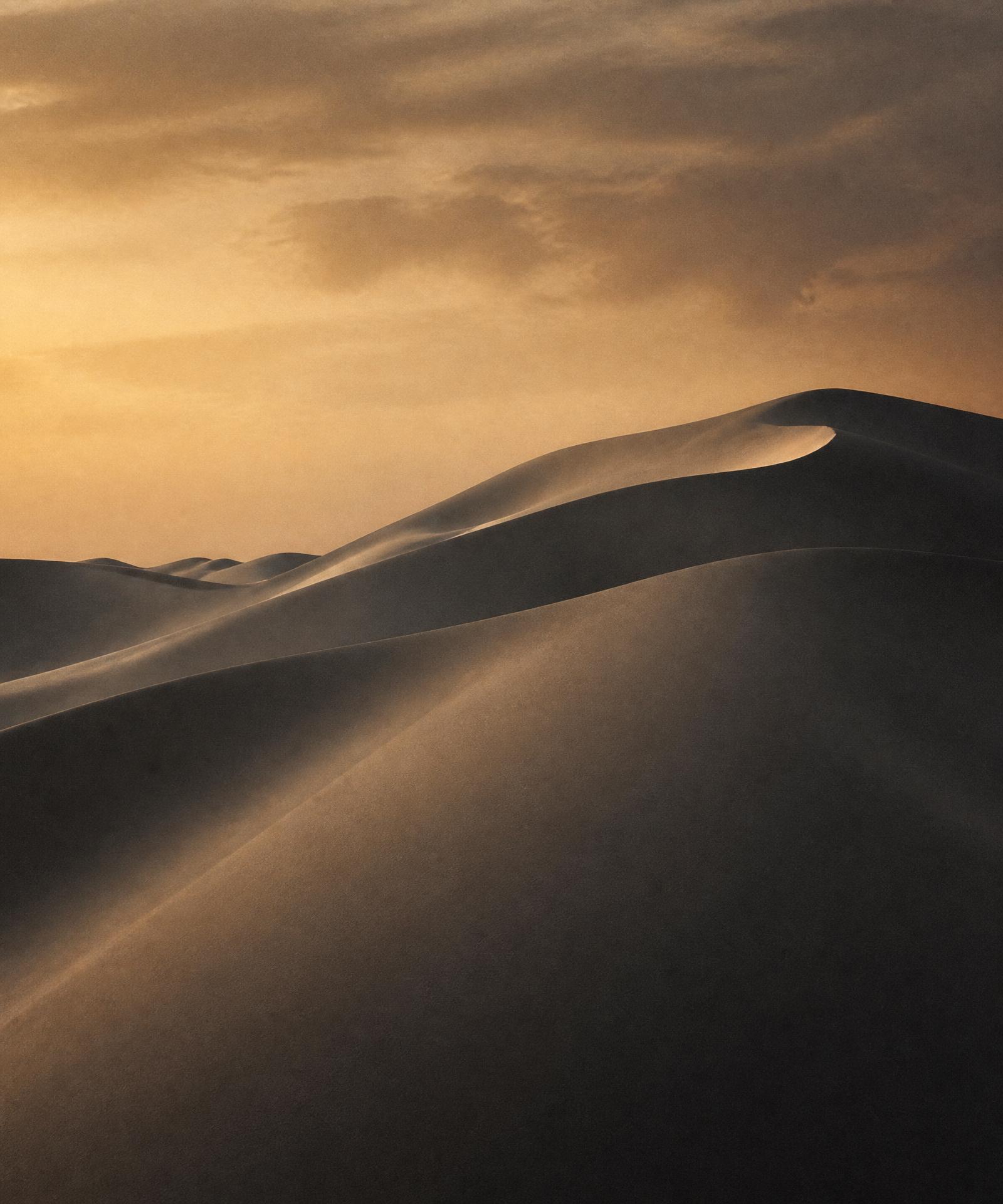 Desert dunes at dusk